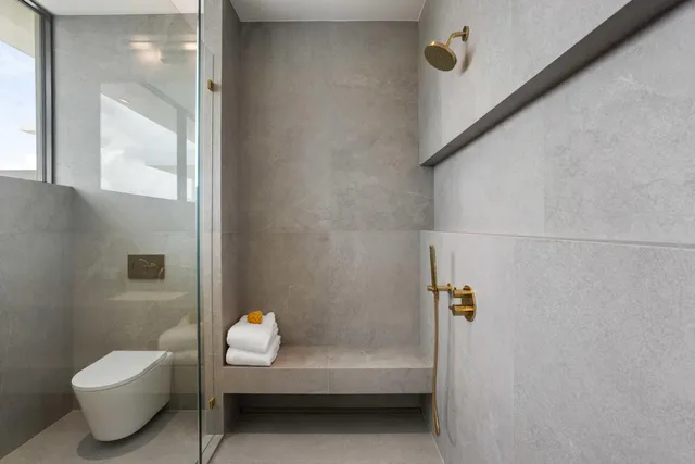 a view of swimming pool with outdoor seating and plants