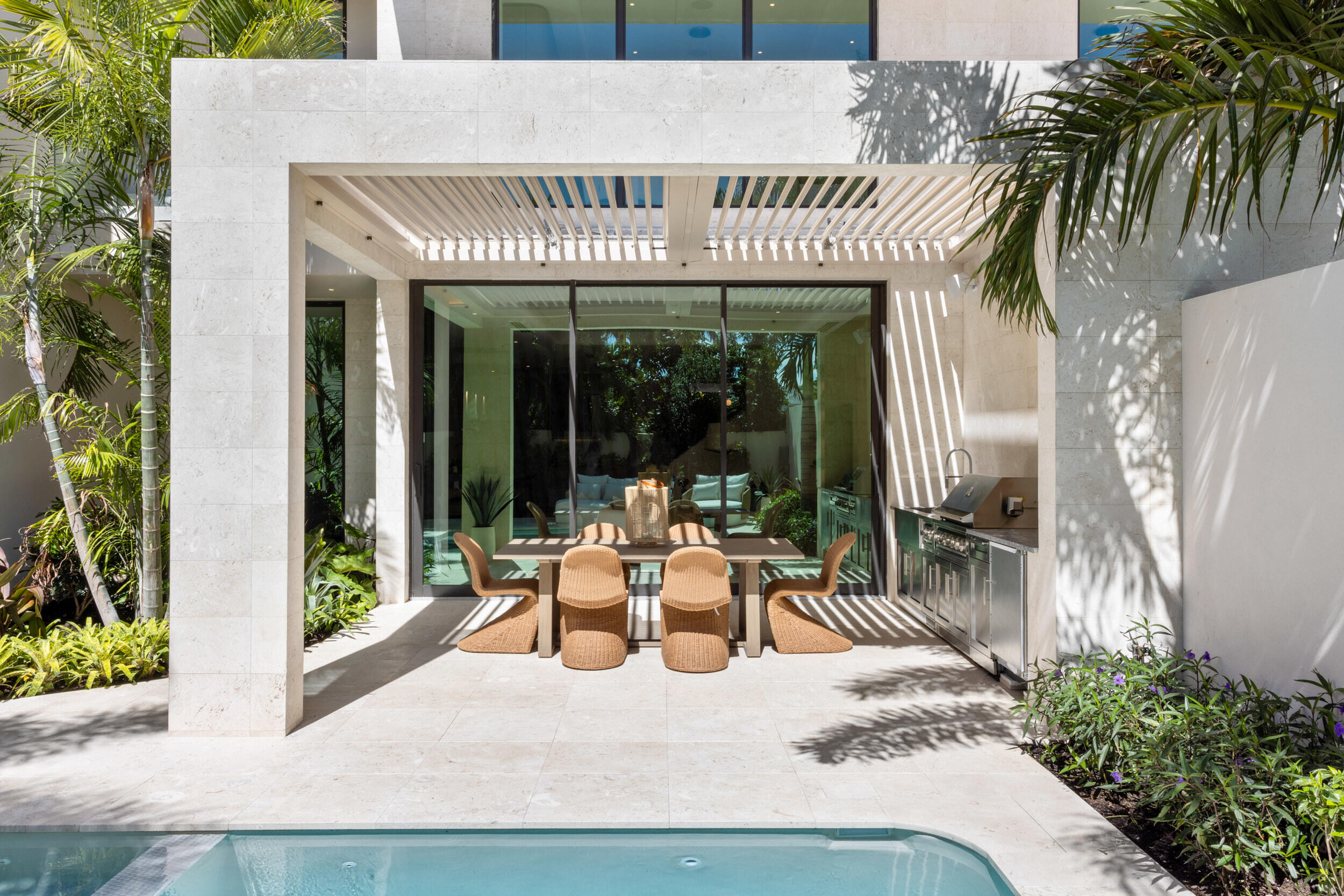 1252 George Bush Boulevard Delray Beach, FL 33483 - Photo 61 of 63 a view of a patio with furniture and floor to ceiling window