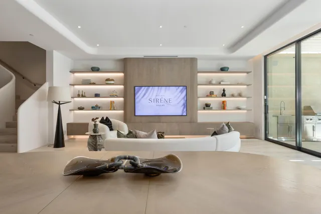 a large kitchen with a large window and counter space