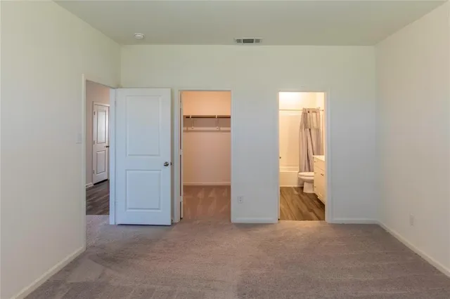 a view of kitchen with wooden floor