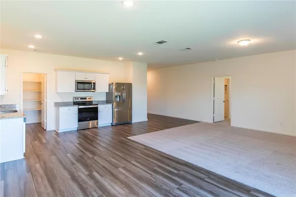 an aerial view of a house with a garden
