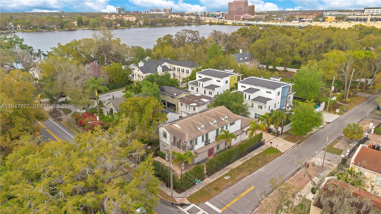 555 Peachtree Road Orlando, FL 32804 - Photo 25 of 35 a view of a lake with houses