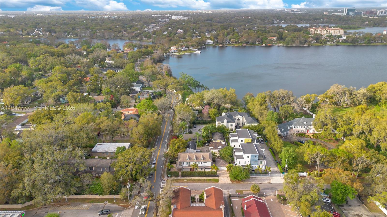 555 Peachtree Road Orlando, FL 32804 - Photo 31 of 35 an aerial view of residential building with outdoor space and lake view