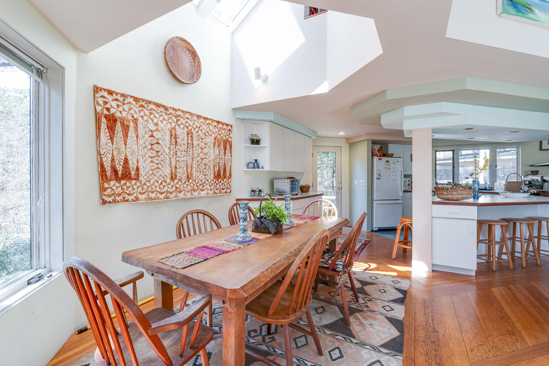 506 Old Chequessett Neck Road Wellfleet, MA 02667 - Photo 11 of 46 a view of a a dining room with furniture and wooden floor