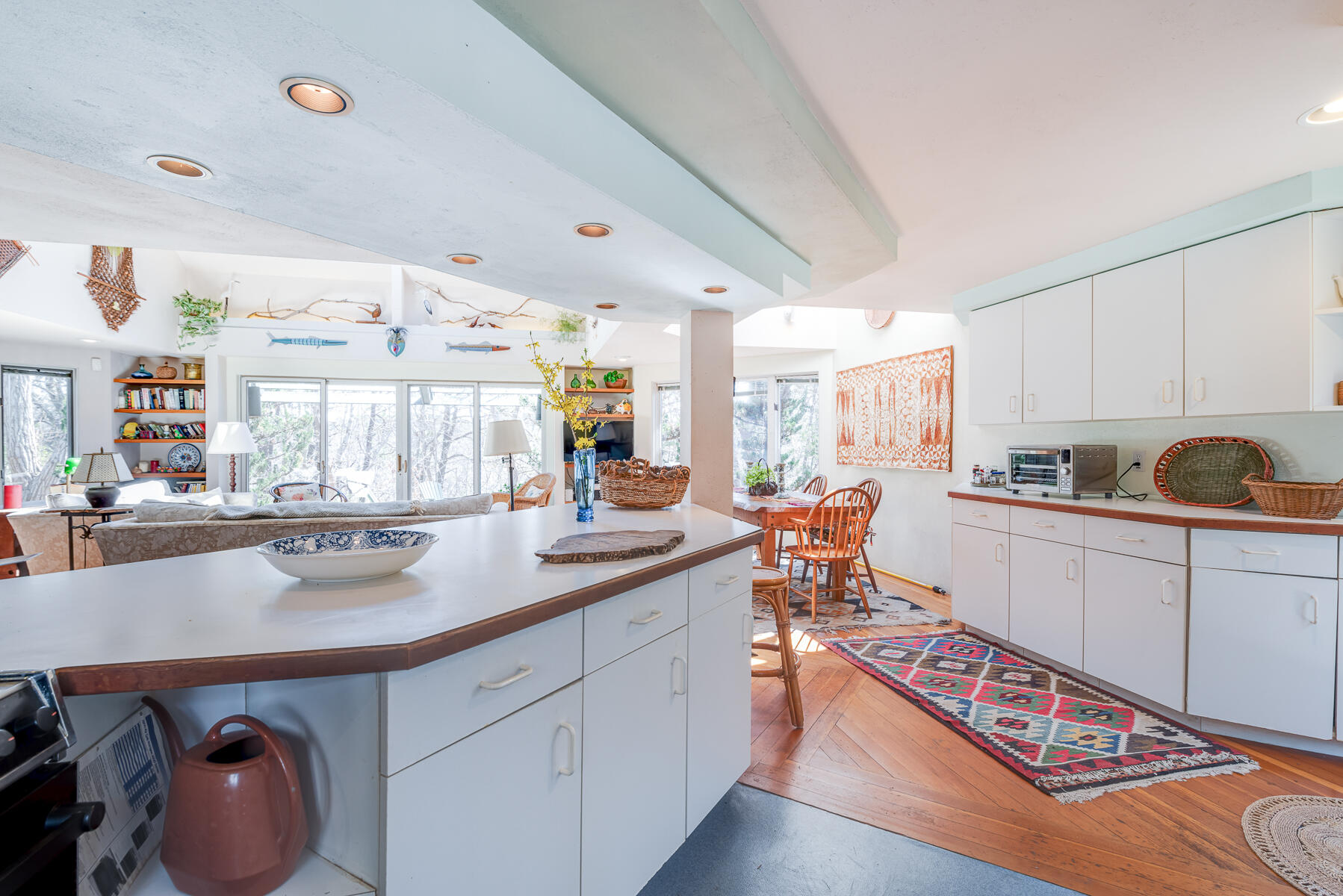 506 Old Chequessett Neck Road Wellfleet, MA 02667 - Photo 14 of 46 a kitchen with stainless steel appliances granite countertop a sink cabinets and wooden floor