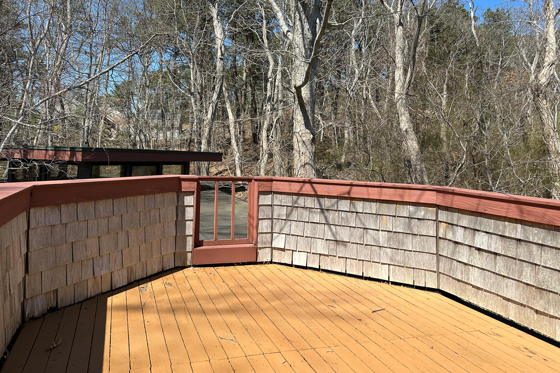 506 Old Chequessett Neck Road Wellfleet, MA 02667 - Photo 22 of 46 a view of a balcony with a pot
