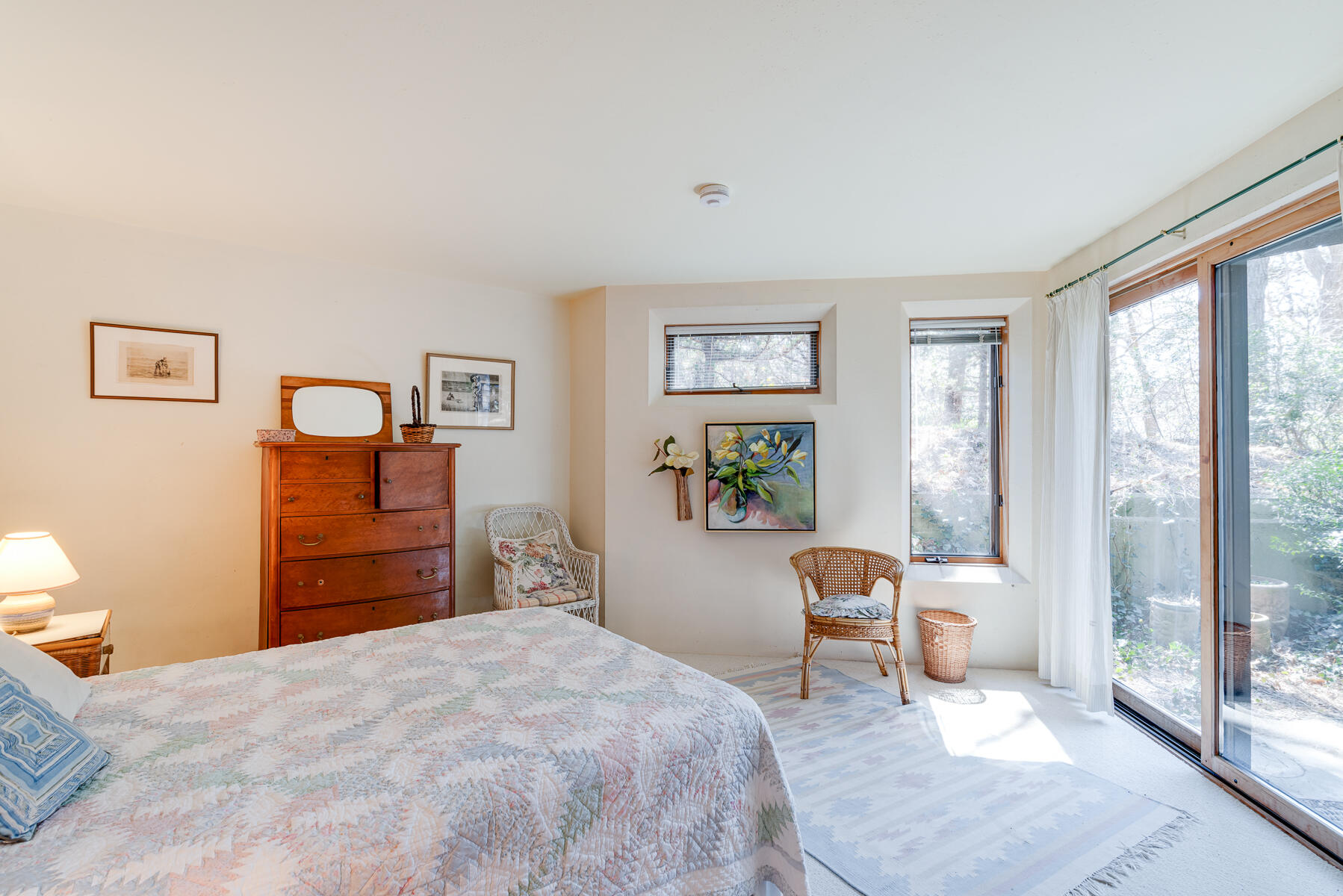 506 Old Chequessett Neck Road Wellfleet, MA 02667 - Photo 27 of 46 a bedroom with a bed and wooden floor