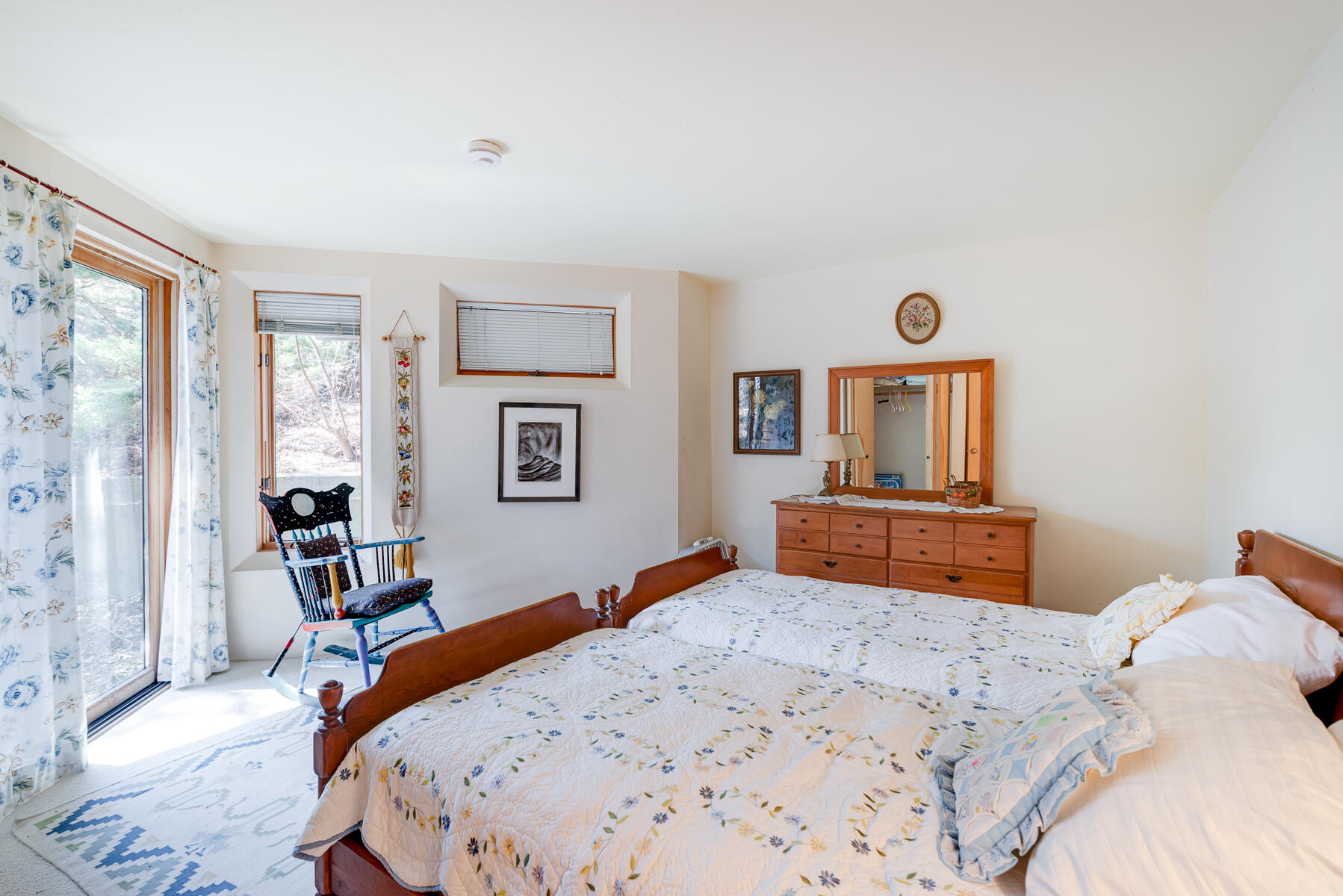 506 Old Chequessett Neck Road Wellfleet, MA 02667 - Photo 28 of 46 a bedroom with a large bed and a tv