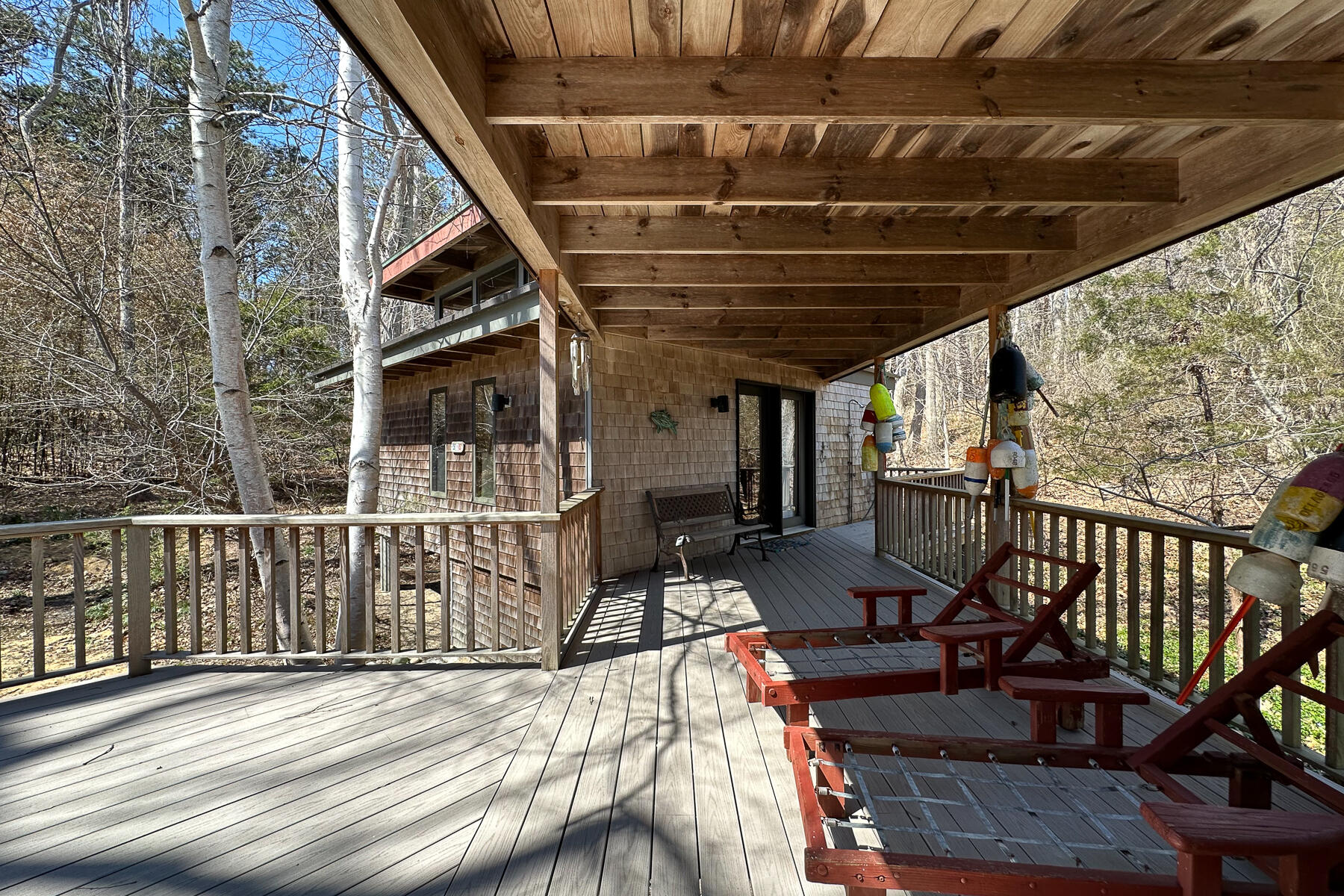 506 Old Chequessett Neck Road Wellfleet, MA 02667 - Photo 32 of 46 a view of a balcony with chairs