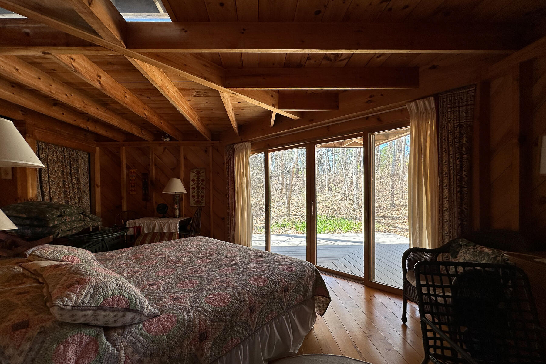 506 Old Chequessett Neck Road Wellfleet, MA 02667 - Photo 34 of 46 a bed sitting in a bedroom next to a window