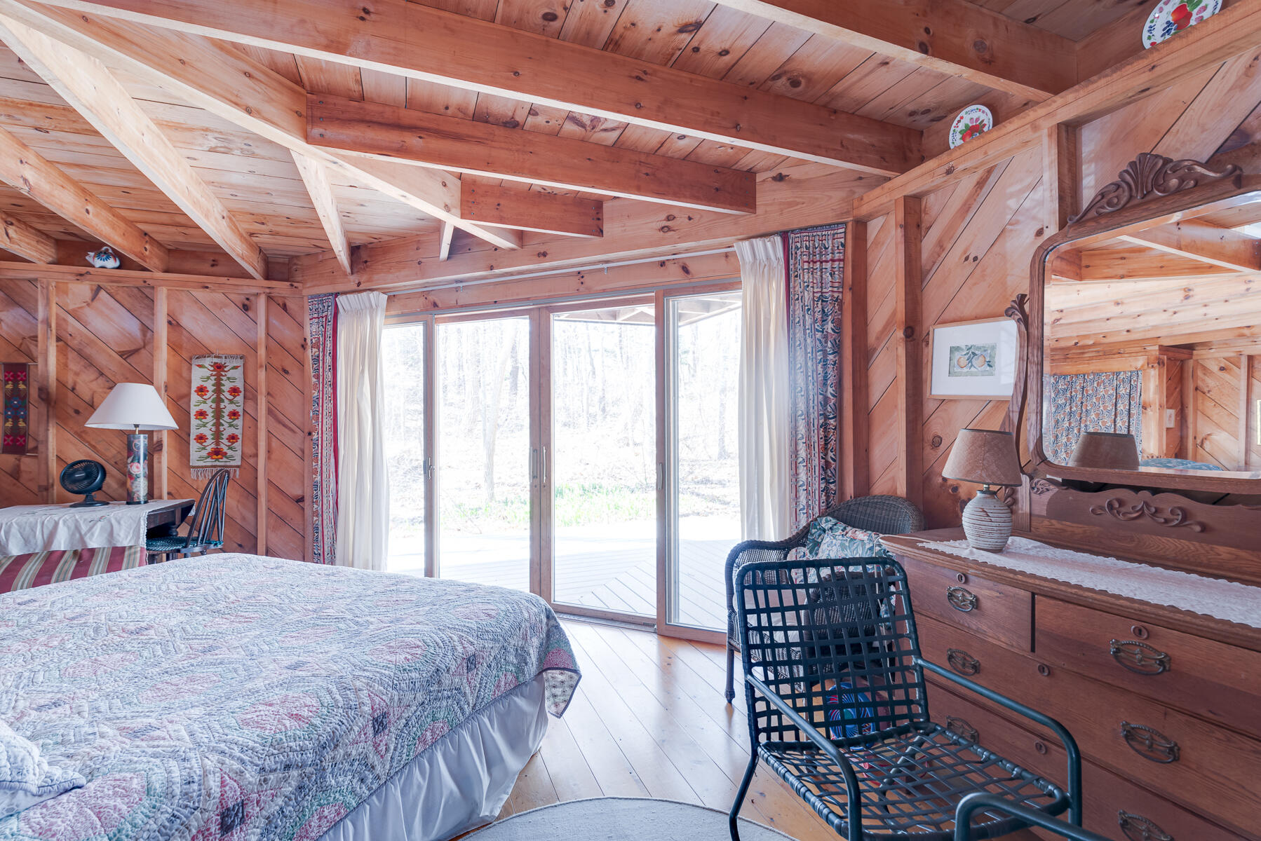 506 Old Chequessett Neck Road Wellfleet, MA 02667 - Photo 35 of 46 a bed room with a bed and a chair