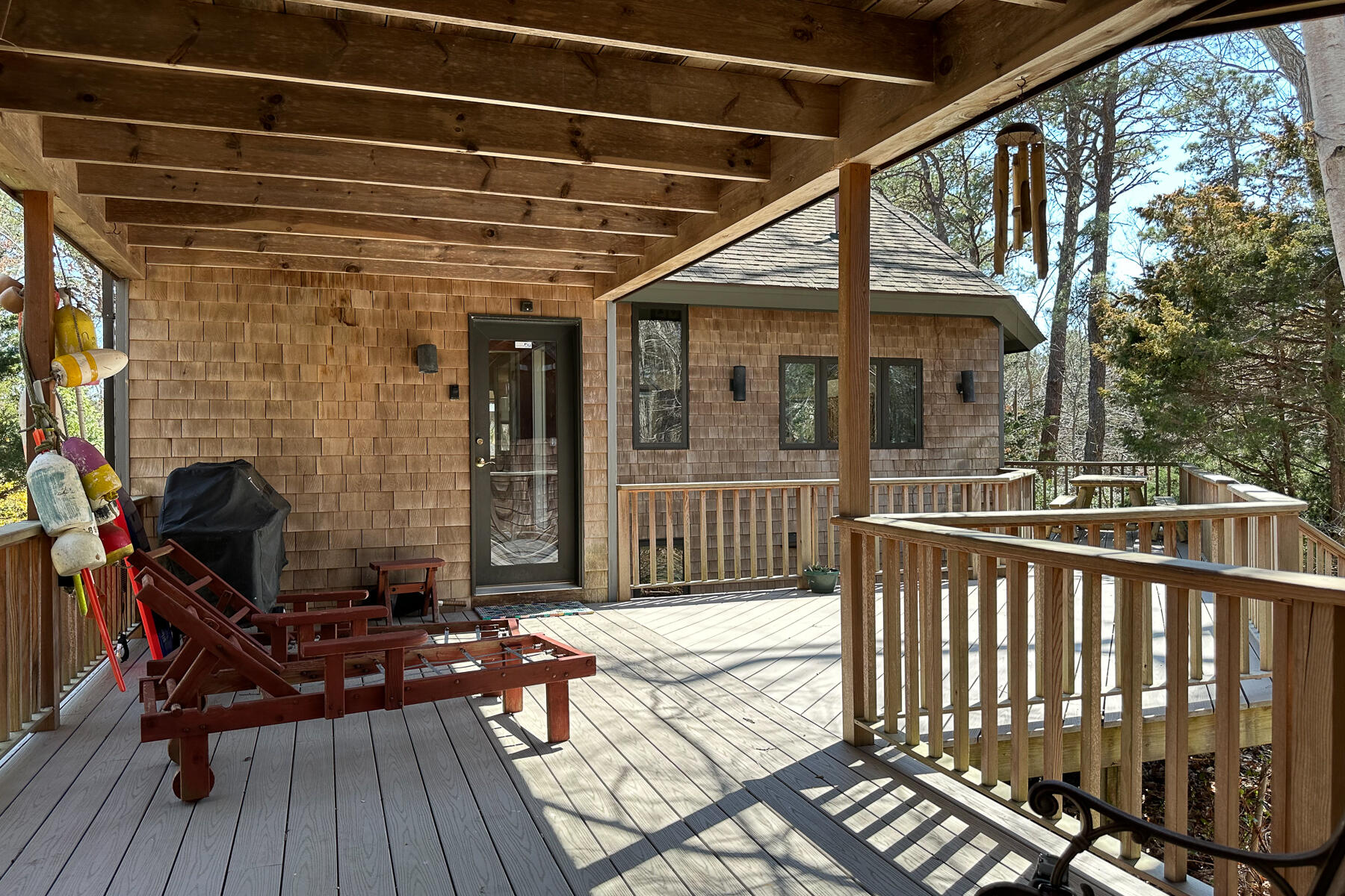 506 Old Chequessett Neck Road Wellfleet, MA 02667 - Photo 5 of 46 a porch with seating space