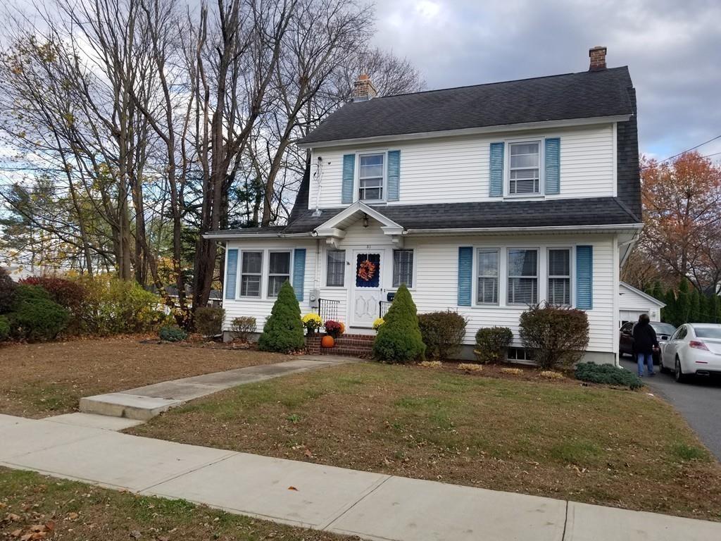 51 Reed Street Agawam, MA 01001 - Photo 13 of 14 a front view of a house with a yard and seating space
