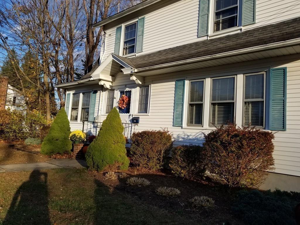 51 Reed Street Agawam, MA 01001 - Photo 14 of 14 a front view of a house with garden