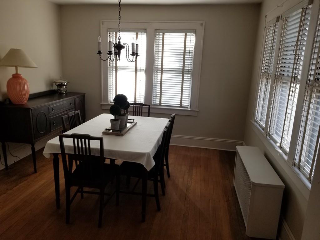 51 Reed Street Agawam, MA 01001 - Photo 7 of 14 a view of a dining room with furniture window and wooden floor