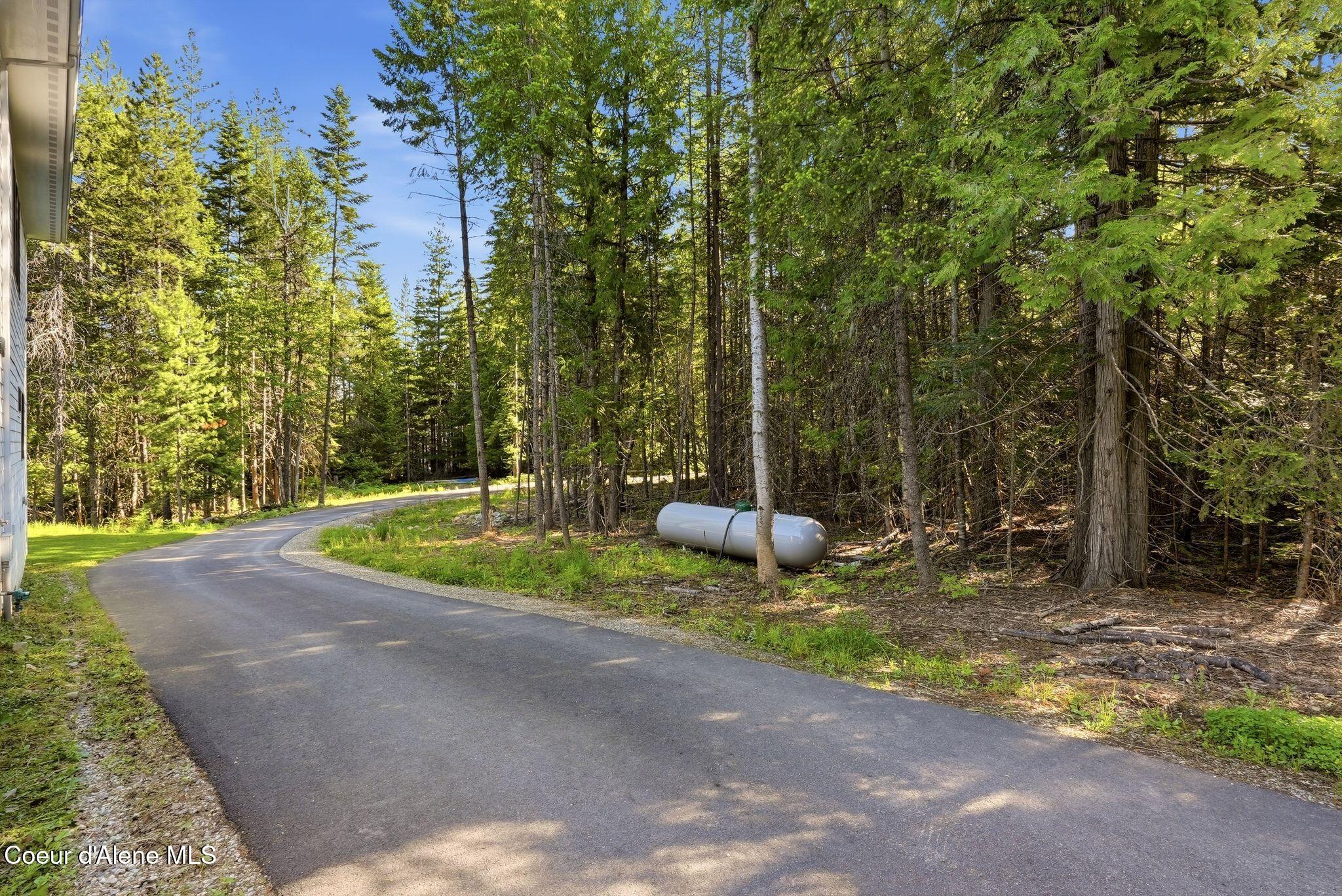 95 Klickitat Road Cocolalla, ID 83813 - Photo 61 of 66 Paved Driveway