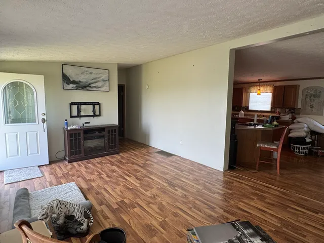 a bedroom with a bed and furniture