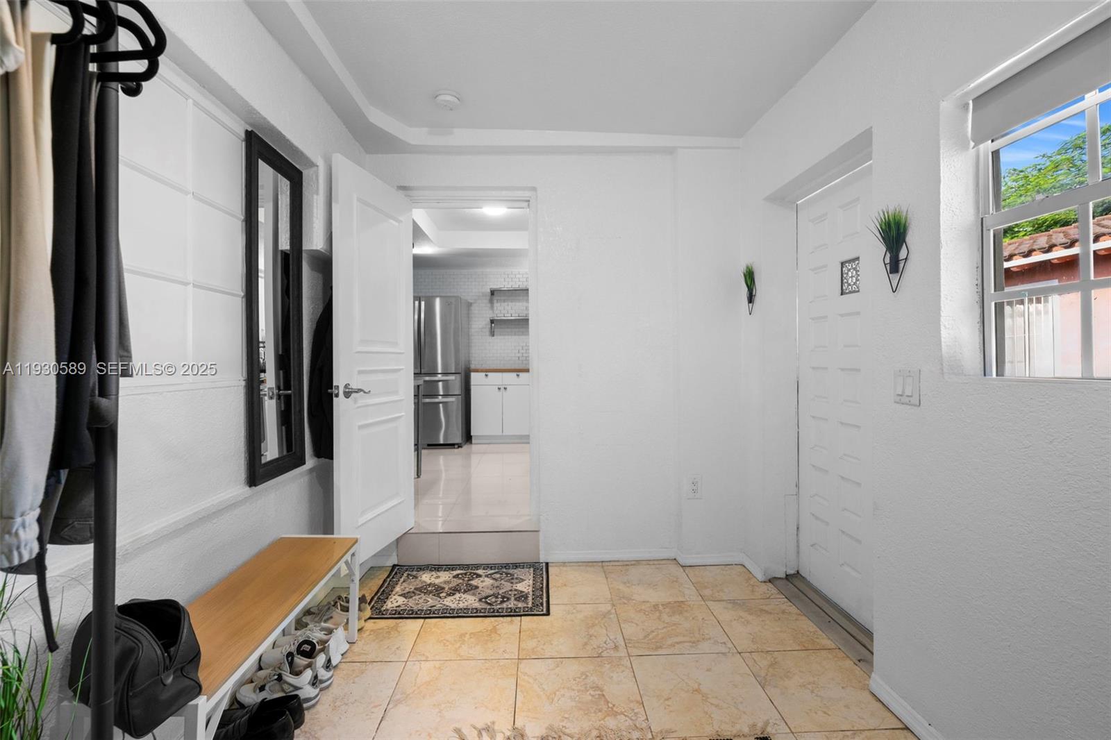 555 Northeast 73rd Street Miami, FL 33138 - Photo 11 of 32 a bathroom with a bathtub and shower