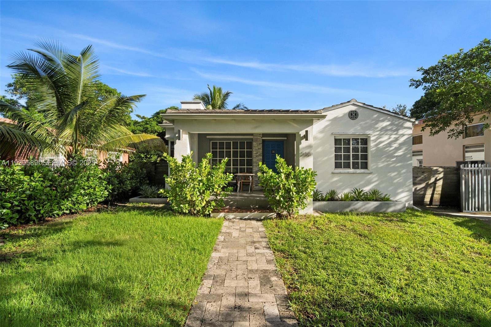 555 Northeast 73rd Street Miami, FL 33138 - Photo 32 of 32 a front view of a house with a yard
