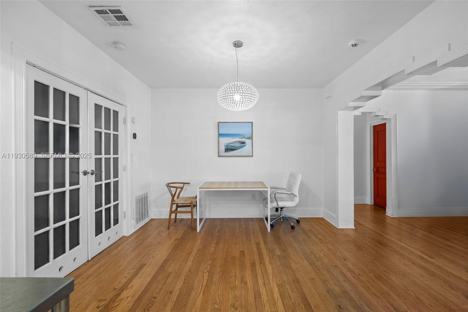555 Northeast 73rd Street Miami, FL 33138 - Photo 6 of 32 a room with a workspace and a window