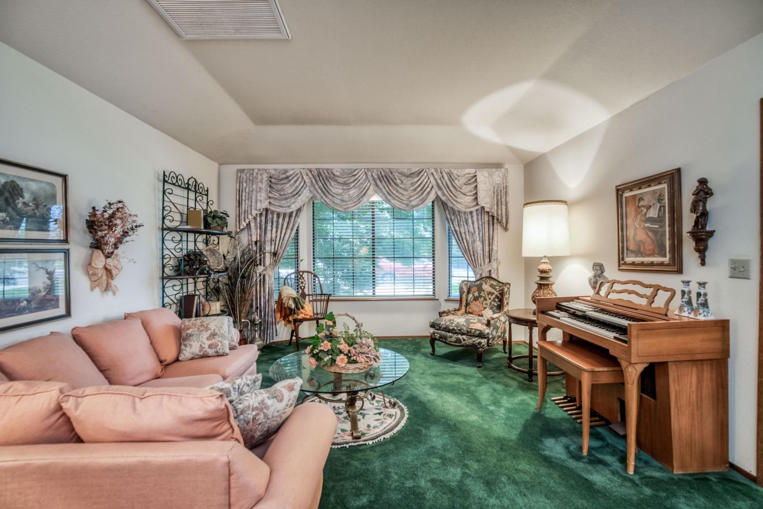77 Post Avenue Sanger, CA 93657 - Photo 15 of 62 a living room with furniture and a large window