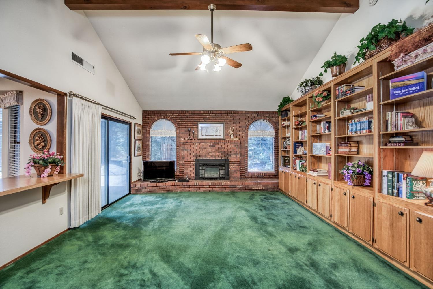 77 Post Avenue Sanger, CA 93657 - Photo 25 of 62 a view of an empty room with window and cabinet
