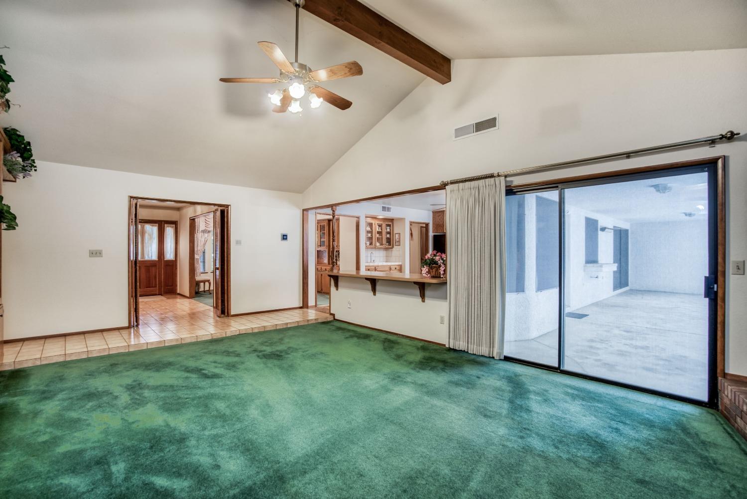 77 Post Avenue Sanger, CA 93657 - Photo 27 of 62 a view of an empty room with closet and wooden floor
