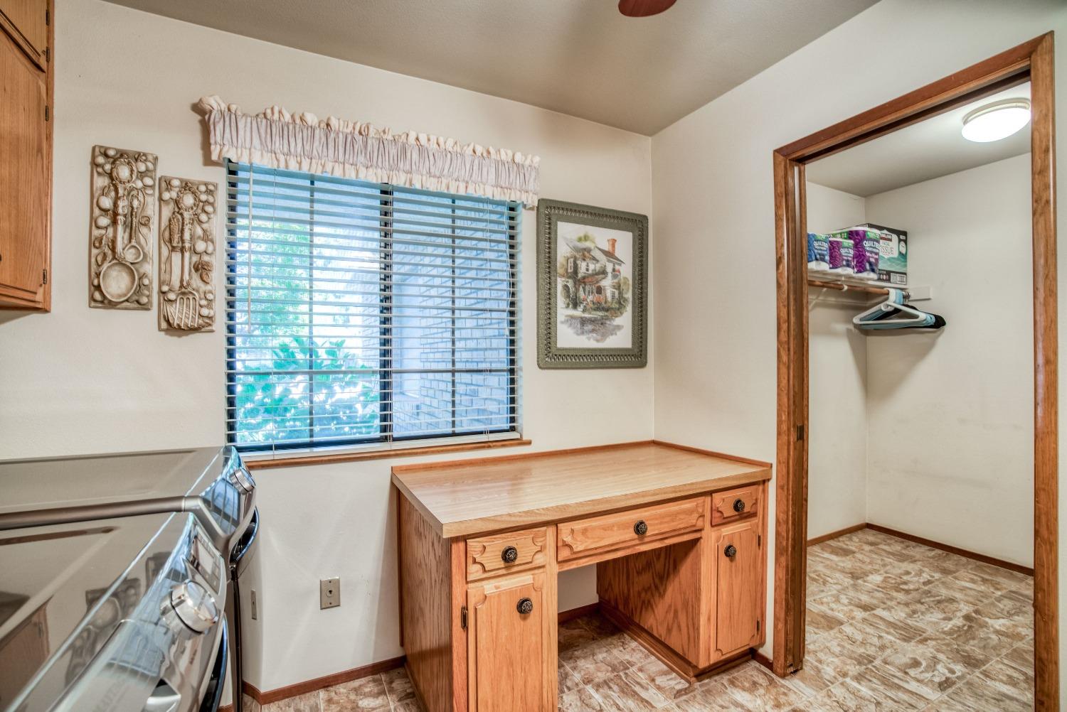 77 Post Avenue Sanger, CA 93657 - Photo 35 of 62 a view of a room that has a bed and a window