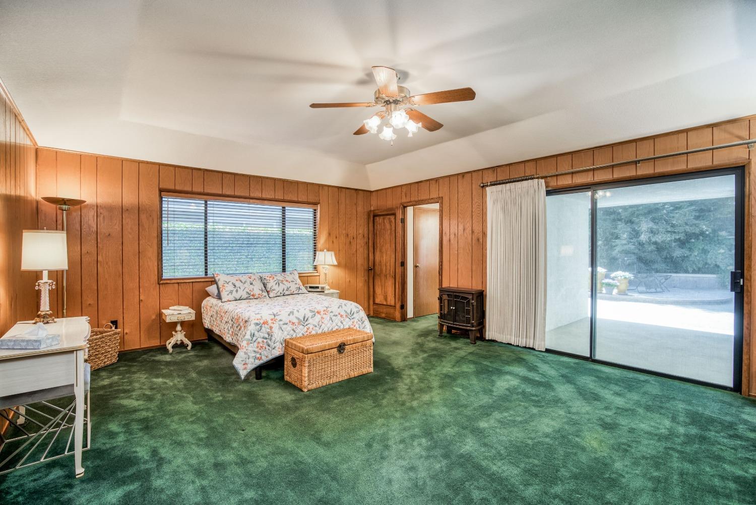 77 Post Avenue Sanger, CA 93657 - Photo 38 of 62 a spacious bedroom with a bed and a window