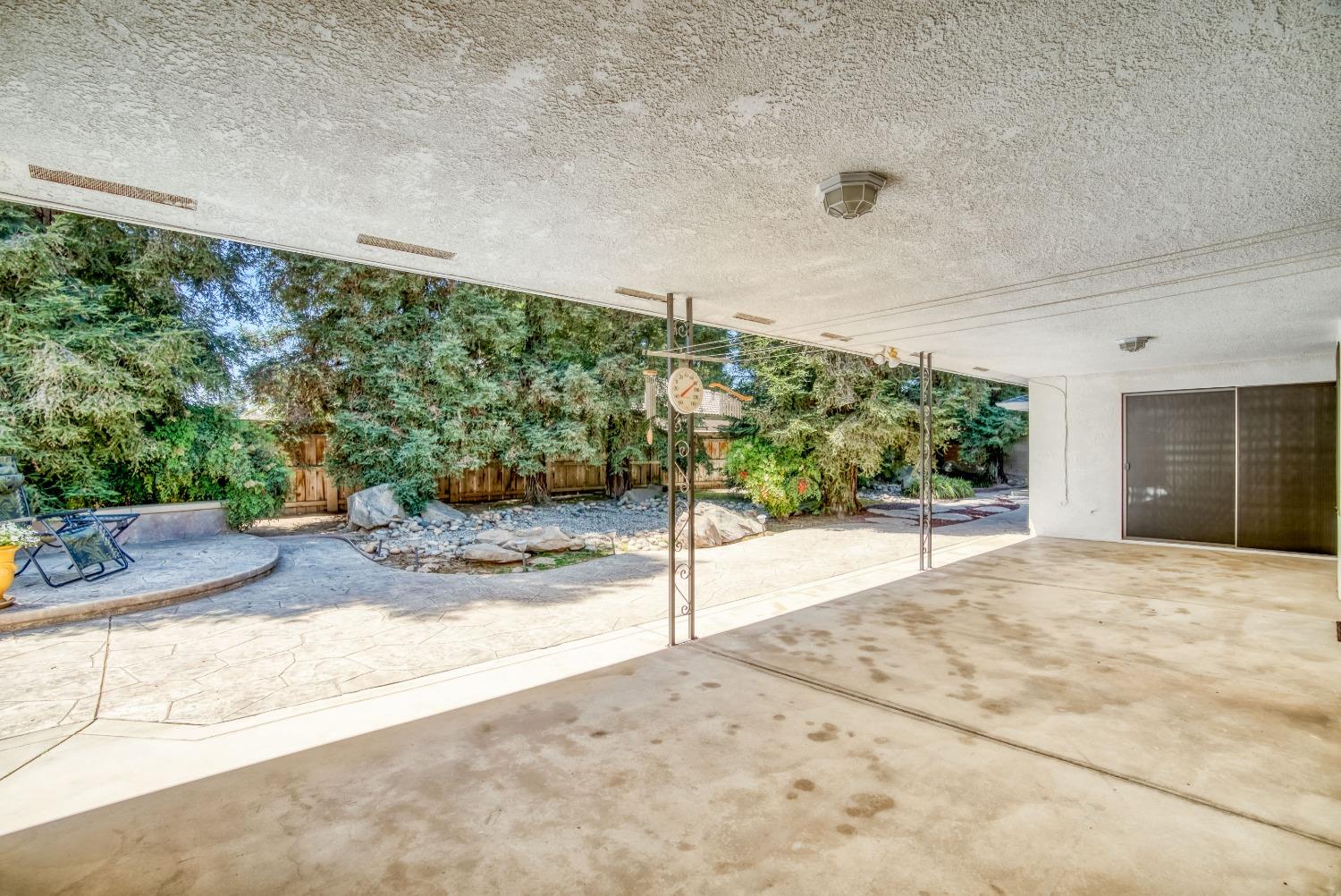 77 Post Avenue Sanger, CA 93657 - Photo 58 of 62 a view of a backyard of a house