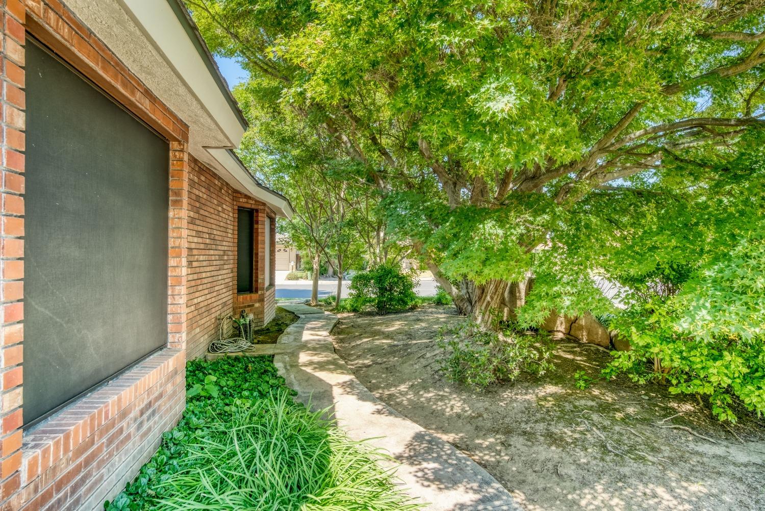 77 Post Avenue Sanger, CA 93657 - Photo 62 of 62 a view of a back yard with green space