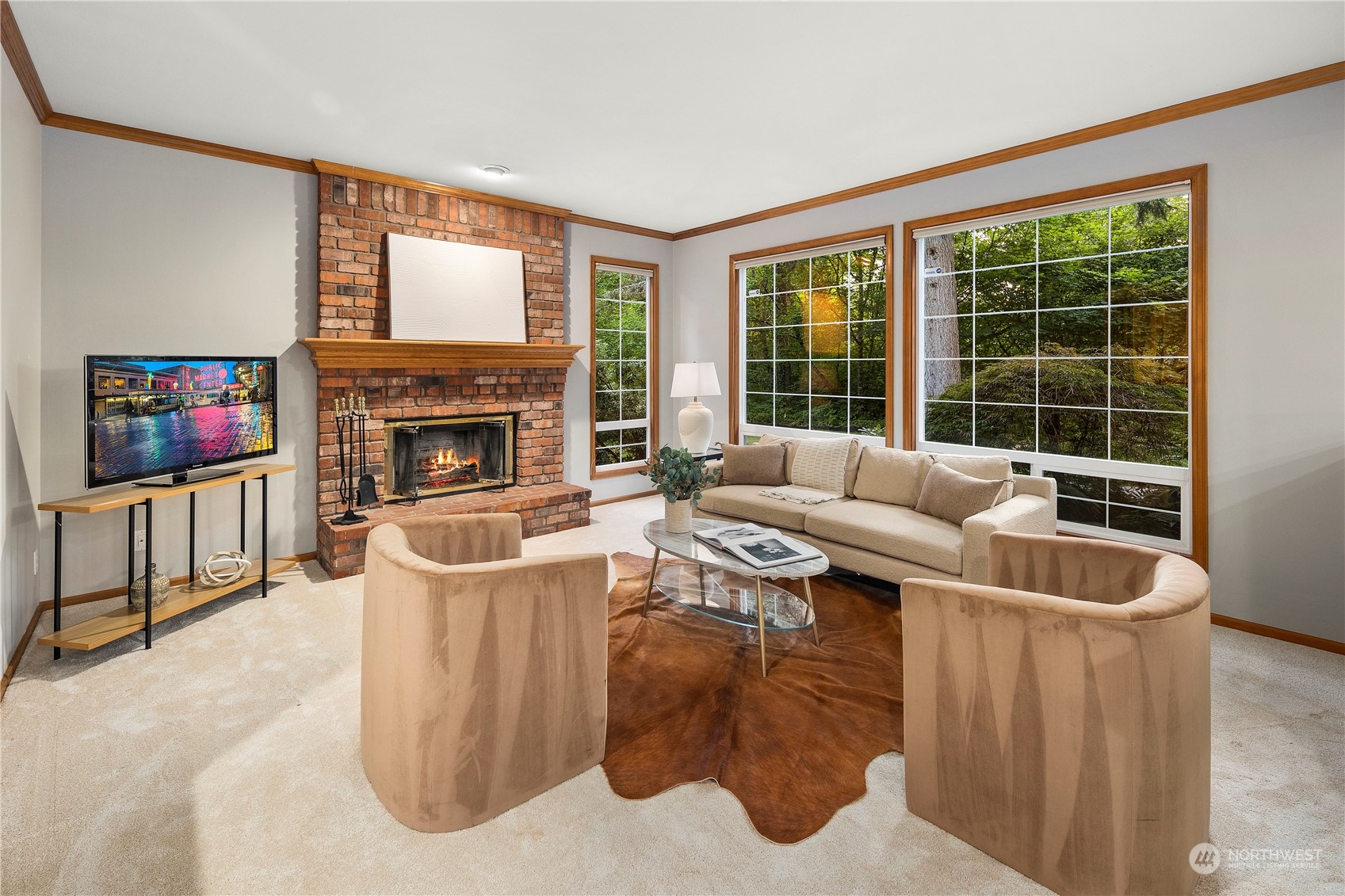 5381 242nd Place Northeast Redmond, WA 98053 - Photo 14 of 40 a living room with furniture a flat screen tv and a fireplace
