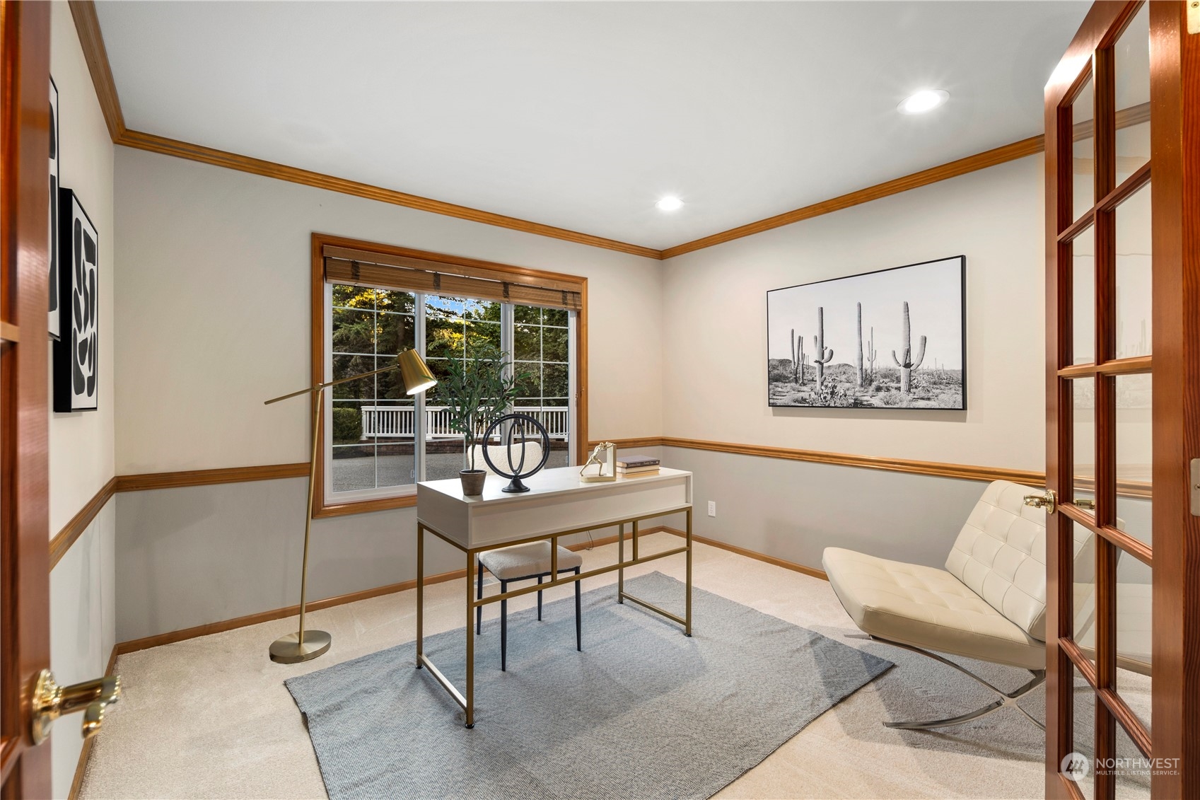 5381 242nd Place Northeast Redmond, WA 98053 - Photo 15 of 40 a work room with furniture and a large window