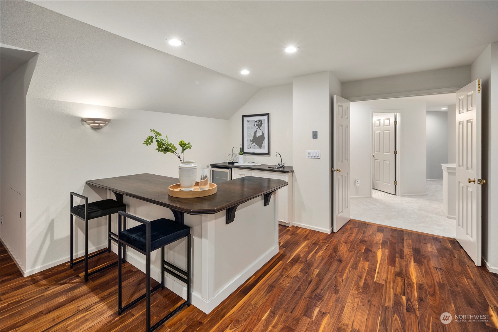 5381 242nd Place Northeast Redmond, WA 98053 - Photo 29 of 40 a kitchen with a sink and chairs
