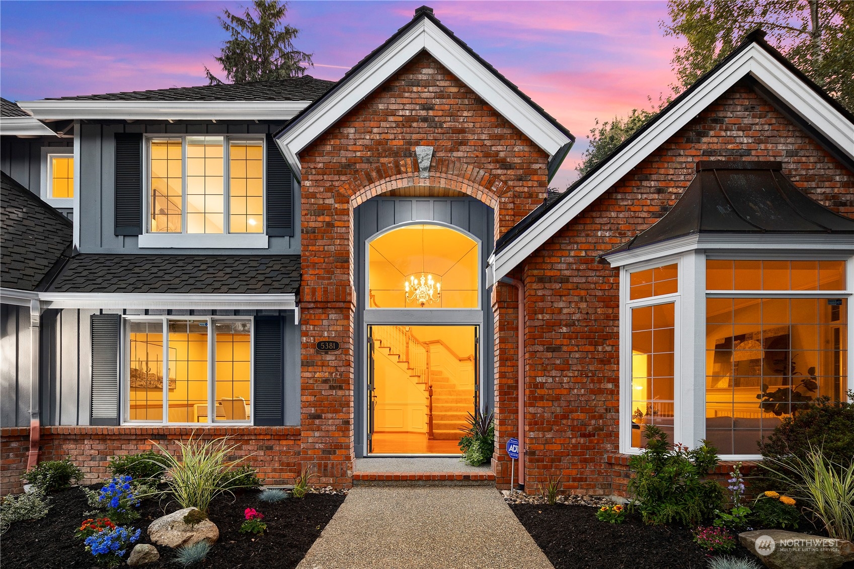 5381 242nd Place Northeast Redmond, WA 98053 - Photo 3 of 40 a front view of a house having yard