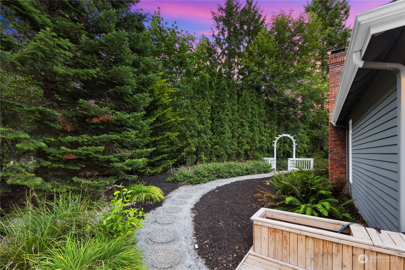 5381 242nd Place Northeast Redmond, WA 98053 - Photo 36 of 40 a view of a garden with potted plants
