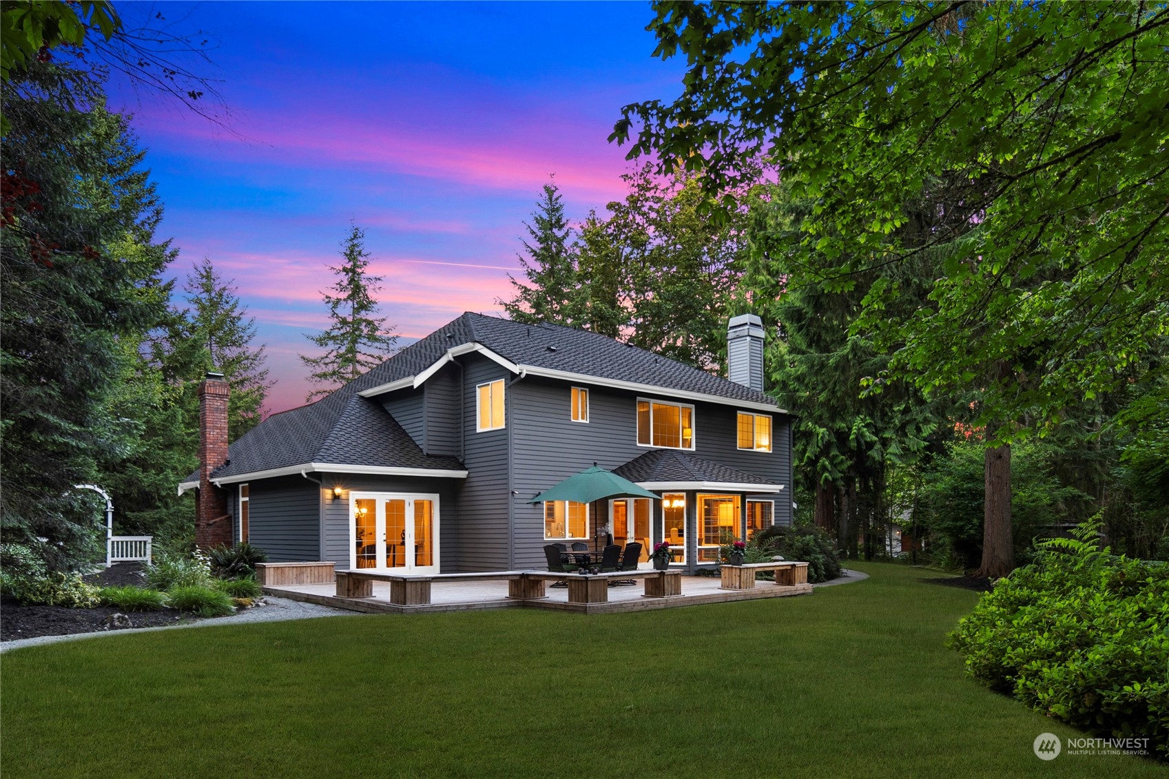 5381 242nd Place Northeast Redmond, WA 98053 - Photo 38 of 40 a front view of a house with a yard table and chairs