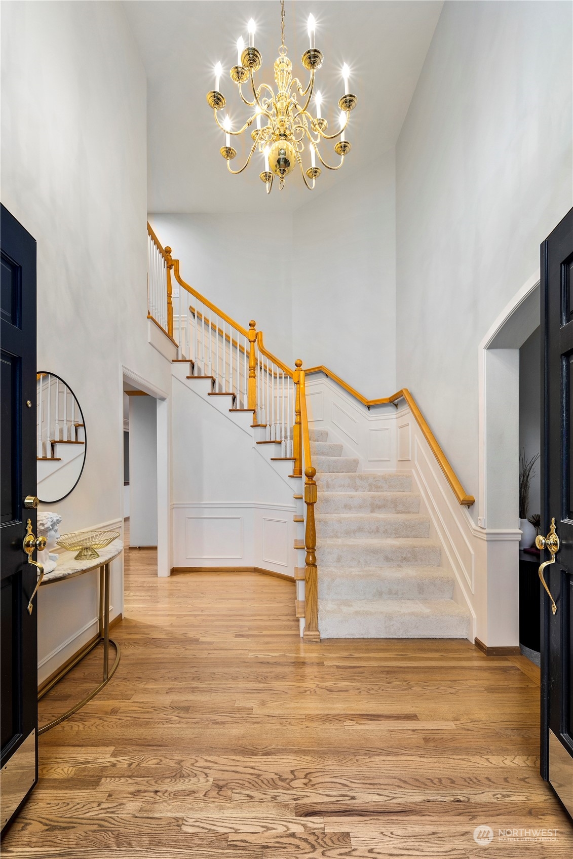 5381 242nd Place Northeast Redmond, WA 98053 - Photo 4 of 40 a view of entryway dining room and hall with wooden floor