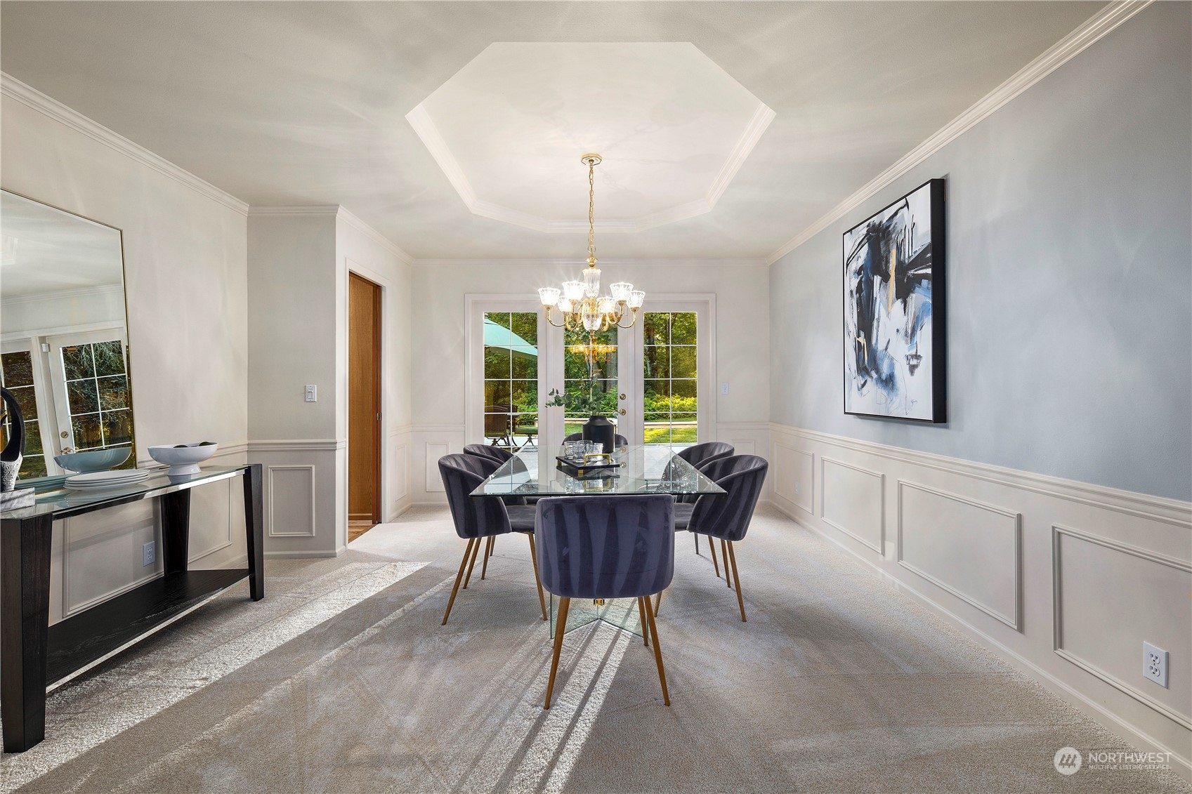 5381 242nd Place Northeast Redmond, WA 98053 - Photo 7 of 40 a dining room with furniture a chandelier and wooden floor