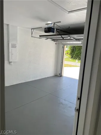 a view of storage and utility room with washer and dryer