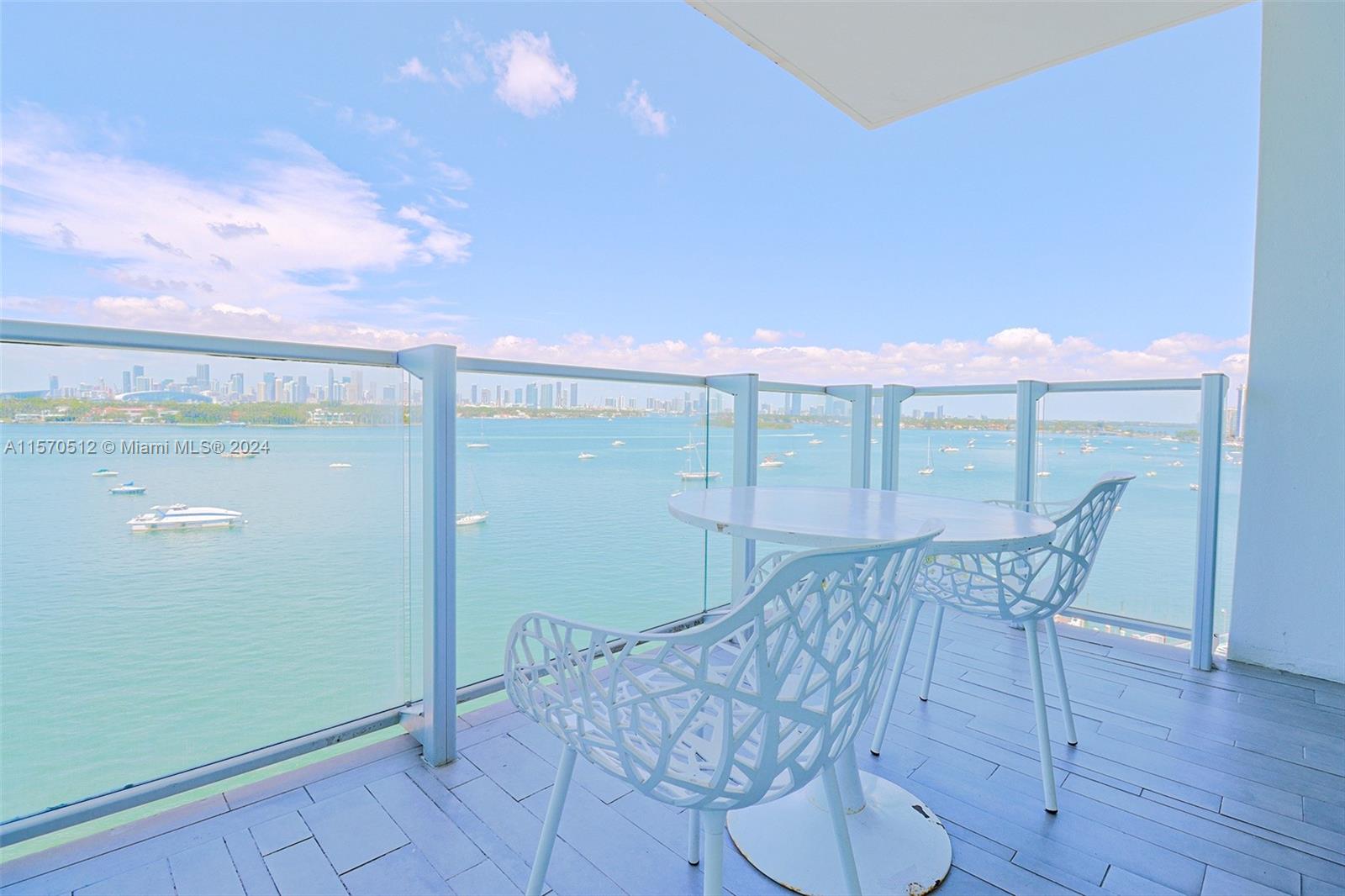1100 West Avenue, Unit 816 Miami Beach, FL 33139 - Photo 19 of 22 a patio with table and chairs