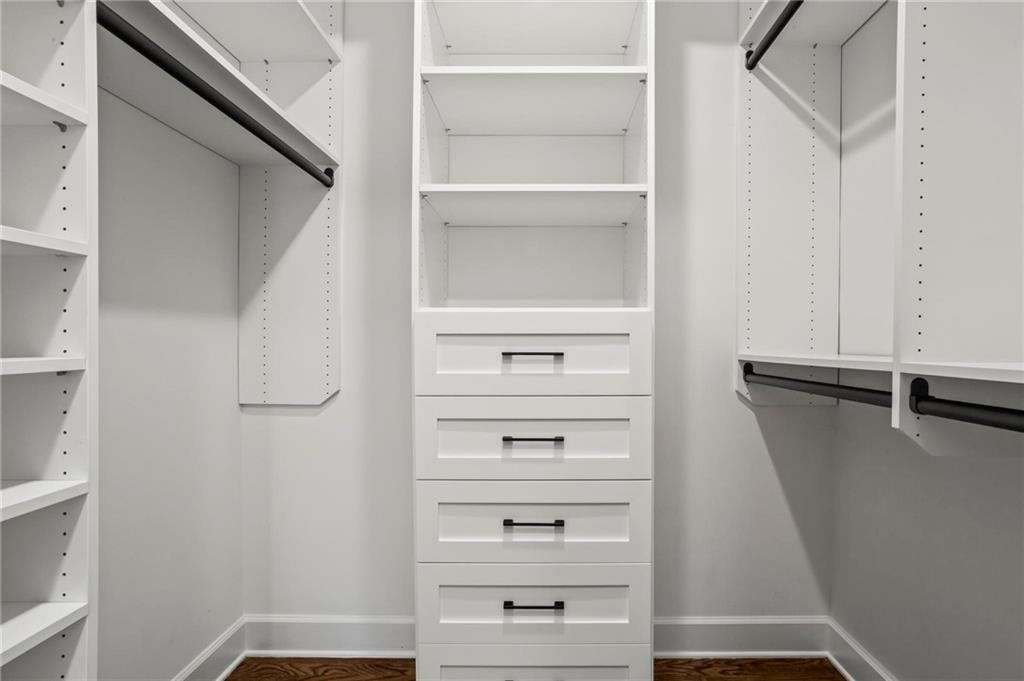 1235 West Garmon Road Northwest Atlanta, GA 30327 - Photo 27 of 46 a view of walk in closet with empty racks