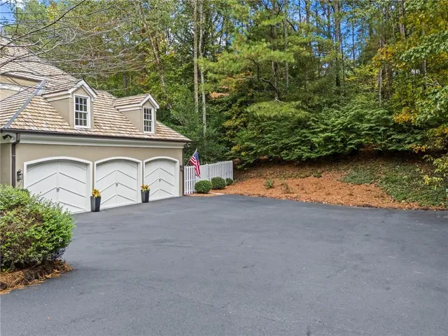 a view of backyard with a garden and entertaining space