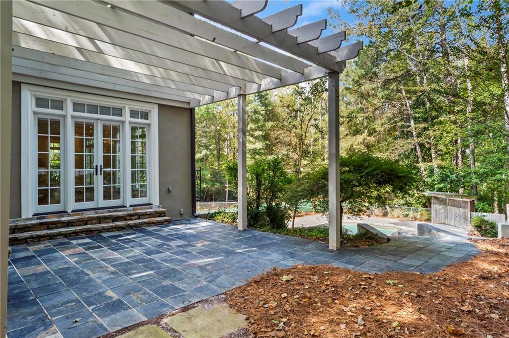 1235 West Garmon Road Northwest Atlanta, GA 30327 - Photo 39 of 46 a view of a house with backyard and garden