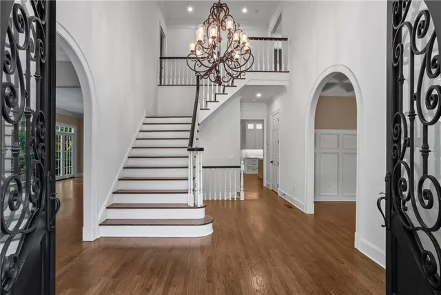a view of entryway with wooden floor