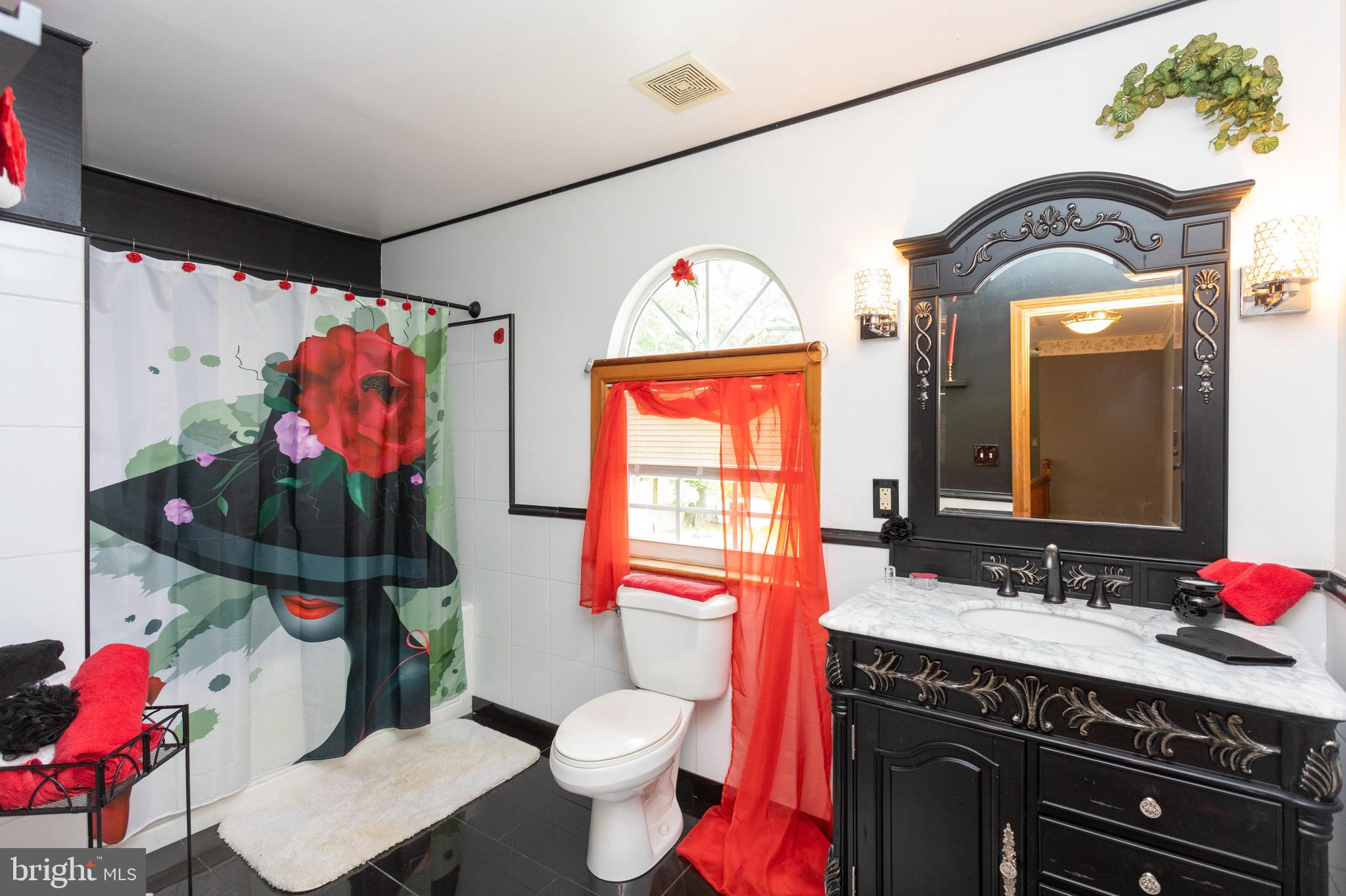 207 Riverside Road Baltimore, MD 21221 - Photo 28 of 36 Upstairs bathroom, marble flooring & vanity!