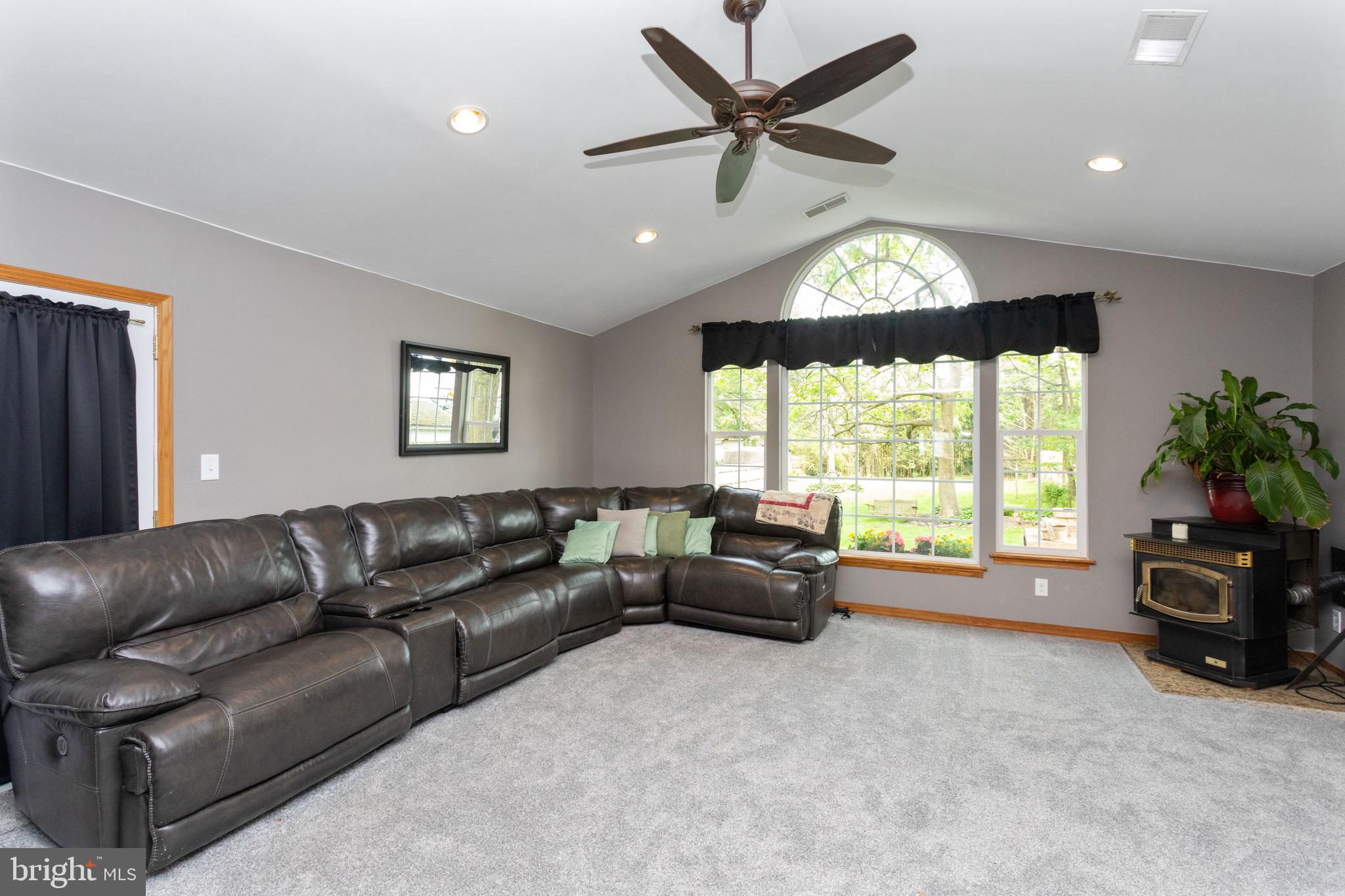 207 Riverside Road Baltimore, MD 21221 - Photo 7 of 36 Large picture window and pellet stove!