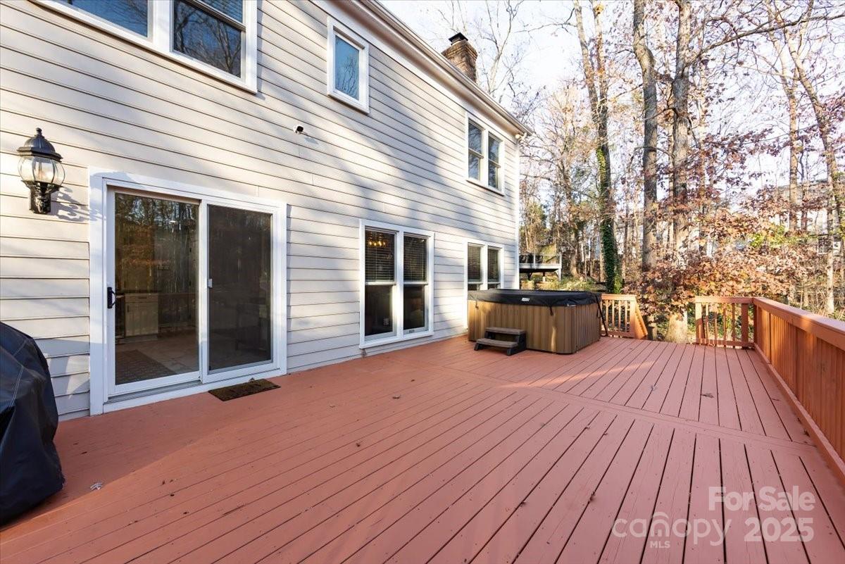 10937 Back Ridge Road Charlotte, NC 28277 - Photo 44 of 45 a view of a house with barbeque oven and wooden floor