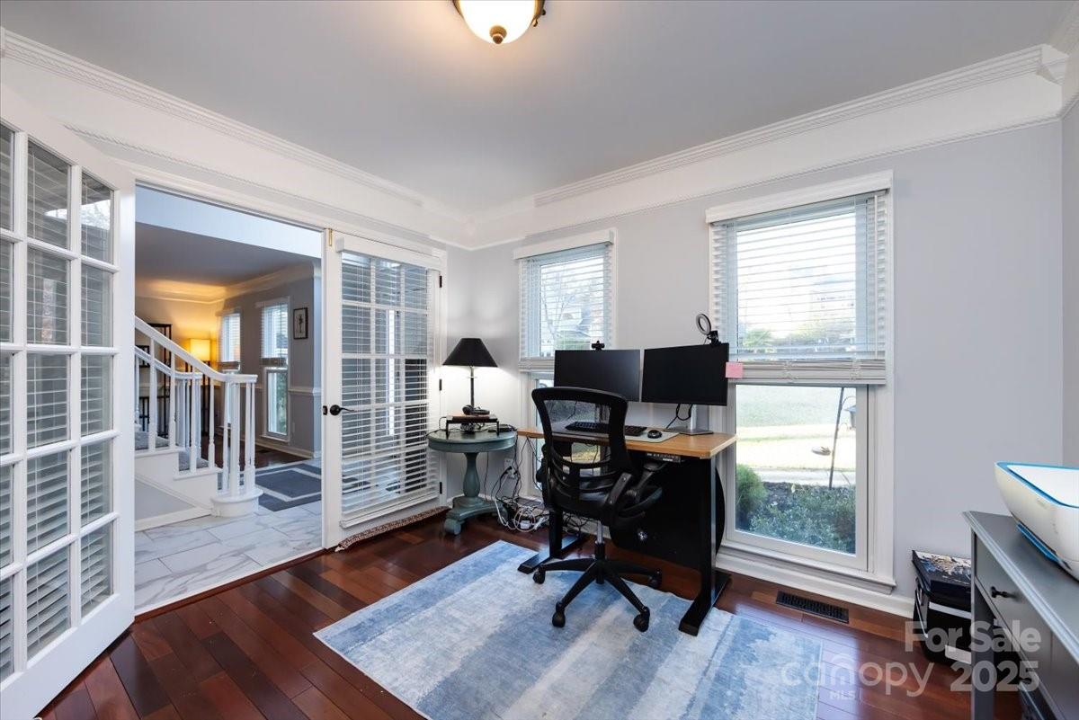 10937 Back Ridge Road Charlotte, NC 28277 - Photo 6 of 45 a view of a workspace with furniture and a window