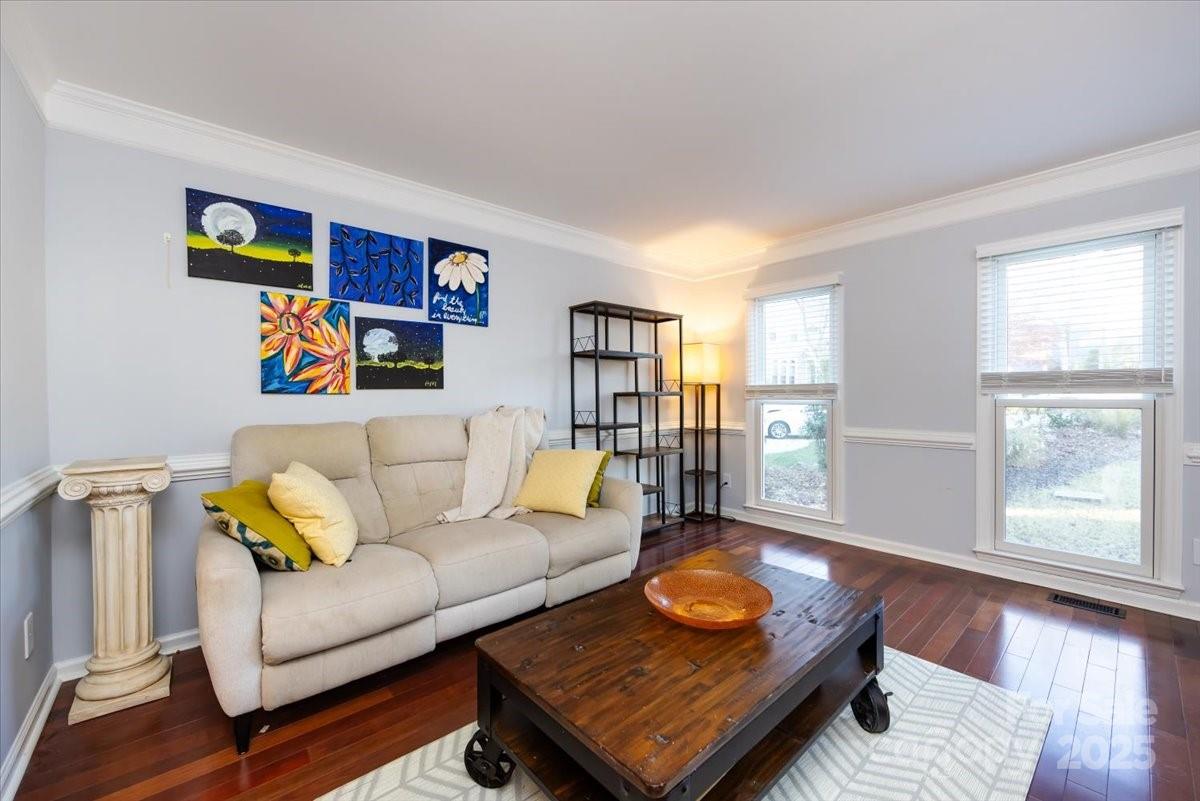 10937 Back Ridge Road Charlotte, NC 28277 - Photo 9 of 45 a living room with furniture and a wooden floor